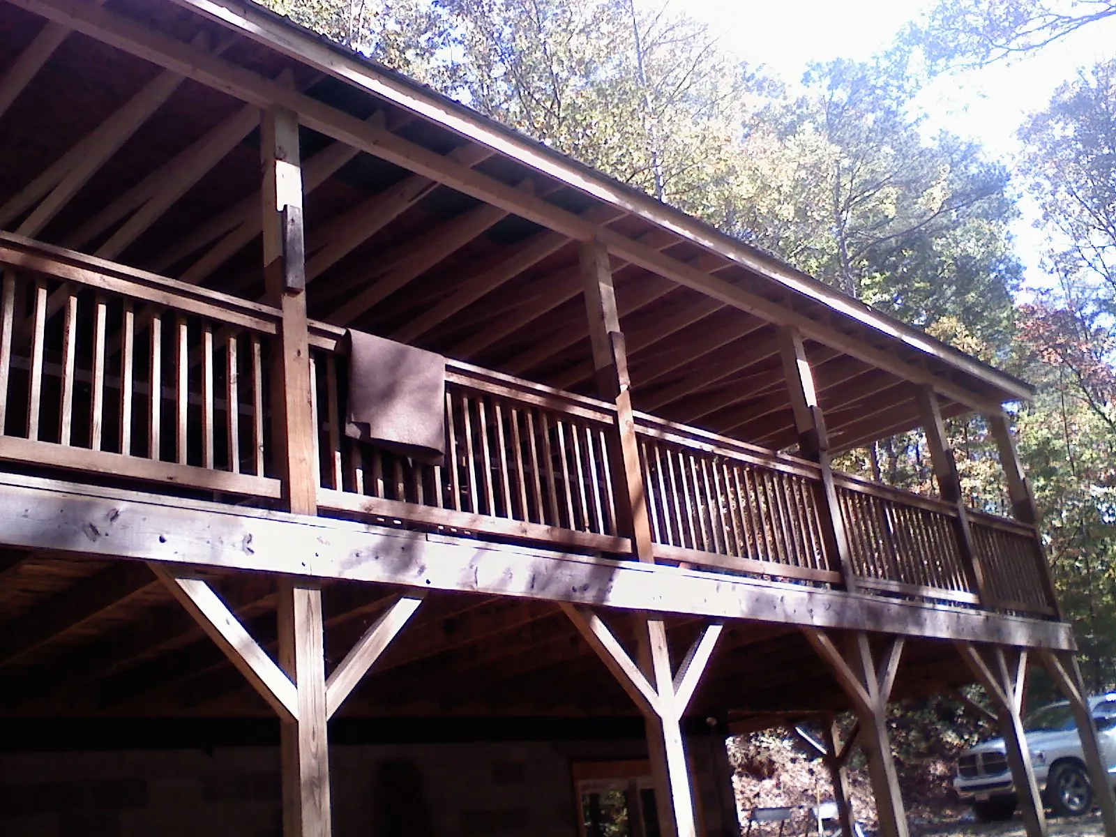 Timber framing under a new elevated porch and deck — Roof Leak Repair in Peck by Roofing Brothers